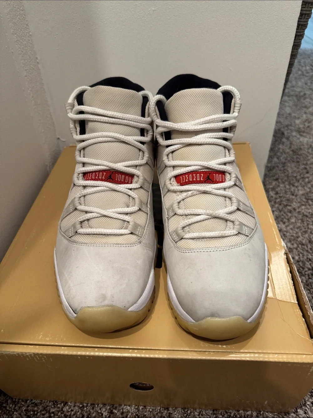 Jordan 11 Men's High-Top Sneakers in Off-White, Gum & Red Accents